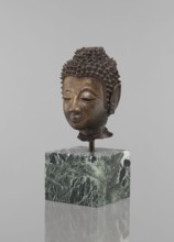 Buddha head - fragment of a sculpture, Buddhist art, Buddhism, art of Southeast Asia, Thai art,
