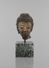 Buddha head - fragment of a sculpture, Buddhist art, Buddhism, art of Southeast Asia, Thai art,