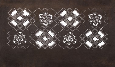 Katagami dyeing stencil with a motif of rhombuses forming crosses and plant-floral patterns