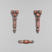 A set of braid ornaments consisting of a clasp and two pendants, late 18th century, Mongolian