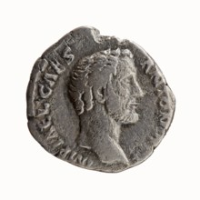 Denarius, 138 CE. Obverse: head of Antoninus Pius without a cap to the right, legend IMP T AEL CAES