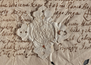 Round seal impression of the town of Jasliska, Ruthenian Voivodeship. On a baroque shield, two