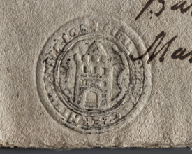 Seal impression of the town of Czerniejów (1654). Fortress tower with an open gate, five