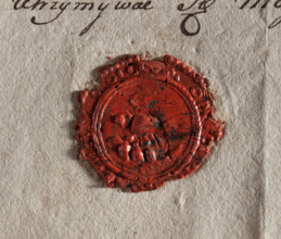 Round wax impression of the seal of Grabów. Pelican turned to the right on the nest, feeding chicks
