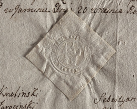 Round seal impression of the town of Jarocin, Sieradz Voivodeship. Tower with an open gate, topped
