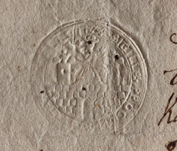 Round seal impression of the city of Kalisz. On the wall with an open gate there is a figure with a