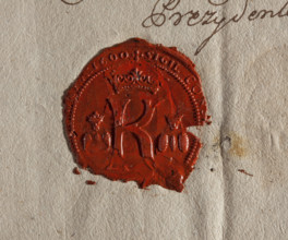 Round wax impression of the seal of Kazimierz — a suburb of Kraków. Under the royal crown the