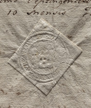 Round seal impression of the town of Kurzelów. Illegible drawing (gate with a tower?). Illegible