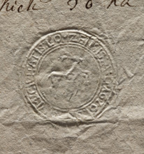 Round seal impression of the town of Lomza. In the central part a deer facing left. In the rim an