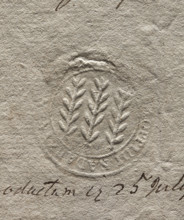 Round imprint of the seal of the town of Nadarzyn. Three vertically positioned branches. Illegible
