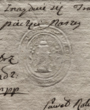 Oval seal impression of the town of Opatówka. Illegible drawing, probably a tower topped with a