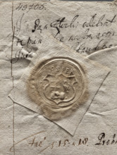 Round seal impression of the town of Osiek. On a decorative shield divided into a column: in the
