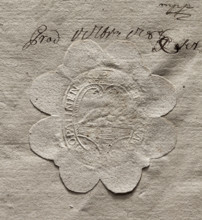Oval seal impression of the town of Opalina. In the decorative crowned cartouche, an illegible