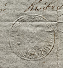 Round seal impression of the town of Ostroleka, poorly legible. Eagle holding a scepter and an orb