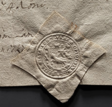 Round seal impression of the town of Piwniczna. On a Baroque shield, a lamb turned to the right,