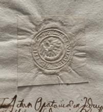 Round imprint of the seal of the town of Polaniec. Royal eagle standing, holding a horn in its