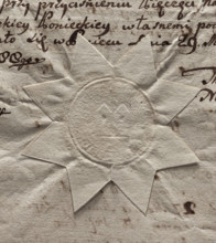 Round seal of the town of Poniec. In the field of the seal, two towers covered with conical roofs.