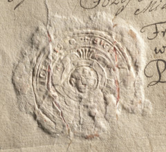 Round seal impression of the town of Proszowice, Kraków Voivodeship. In a round, baroque cartouche