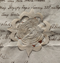 Round seal impression of the town of Proszowice, Kraków Voivodeship. In a round, baroque cartouche