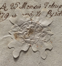 Round seal impression of the town of Pyzdry. Central drawing and inscription illegible. Depicts a