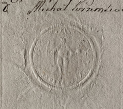 Round seal impression of the town of Skaryszew near Warsaw. In the central field, a knight in