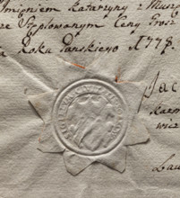Round imprint of the seal of the town of Sobków. Illegible drawing in the decorative cartouche.