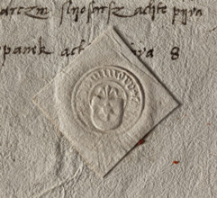 Round dry seal impression of the town of Tarnów. On the shield the Leliwa coat of arms with a jewel