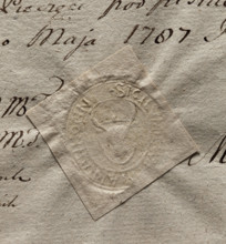Oval impression of the seal of the town of Tykocin. On the shield there is a bison's head with
