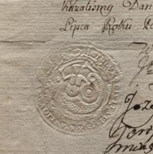 Round impression of the seal of the city of Warsaw. In a Baroque cartouche a mermaid with a fish