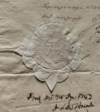 Round impression of the seal of the City of Warsaw. The drawing in the palm branch cartouche is