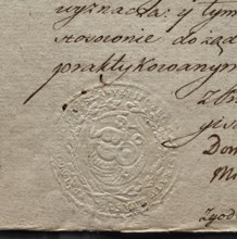 Round impression of the seal of the city of Warsaw. In a wreath of oak branches a mermaid with a