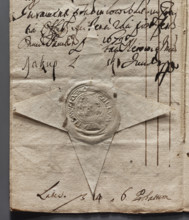 Round dry impression of the town seal of Wachock. Depicts a city wall with three towers, flags on