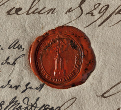 Oval wax seal of the city of Wielun. Obelisk on a pedestal decorated with garlands; a banner atop.