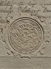 Round imprint of the seal of the Debt Liquidation Commission of the Republic of Poland. On the