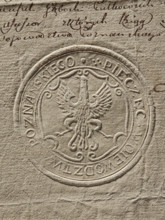 Round seal of the Poznan Voivodeship. Dry impression on a document; round land seal with an eagle