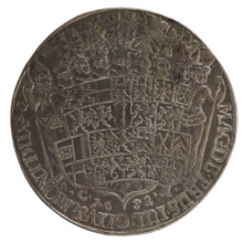 Thaler: Obverse half-figure in decorative armour girded with a sash, sceptre in right hand, helmet