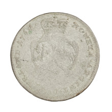 Obverse: In the rim a male bust in armour and a wig, turned to the right, divides an inscription in