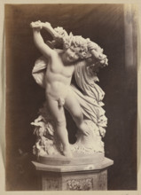 Photograph of a sculpture by Wiktor Brodzki from ca. 1868 depicting a putto with an ivy branch;