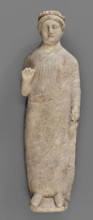 Votive figure of a youth holding a bird, votive offerings, Cypriot sculpture. Figurine of a youth