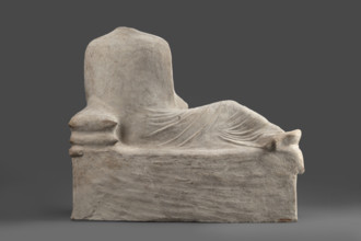 Depiction of a deceased person on a keline and a servant; banquet scene, Cypriot sculpture. The
