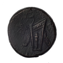 bronze coin, Pantikapaion; obv.: head of young Dionysus in an ivy wreath facing right; reverse: bow