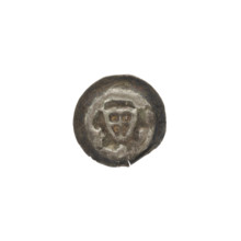 Denarius (bracteate). One-sided coin depicting a triangular shield with a cross whose arms reach