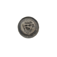 Denarius (bracteate). One-sided coin featuring a triangular shield bearing a cross with arms