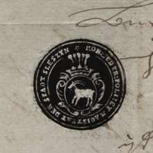 Round ink print of the seal of the town of Sleszyn. In a baroque cartouche, under an open crown