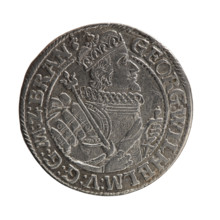 Obv. Bust facing right in a mitre, wide ruff and armor girded with a sash. A sceptre in his right