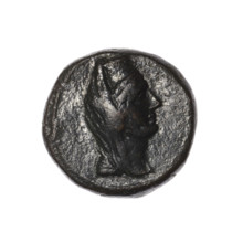 Bronze coin, Pantikapaion (as Kaisarea). Obverse: head of a woman in a kalathos and a veil