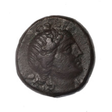 bronze coin, Pantikapaion; obv.: head of young Dionysus in an ivy wreath facing right; rv.: bow and