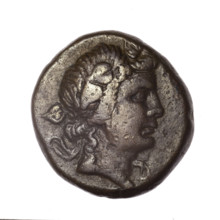 bronze coin, Pantikapaion; obverse: head of young Dionysus in an ivy wreath facing right; reverse: