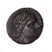 bronze coin, Pantikapaion; obverse: head of young Dionysus in an ivy wreath facing right; reverse: