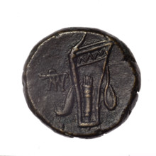 bronze coin, Pantikapaion; obverse: head of young Dionysus in an ivy wreath facing right; reverse: